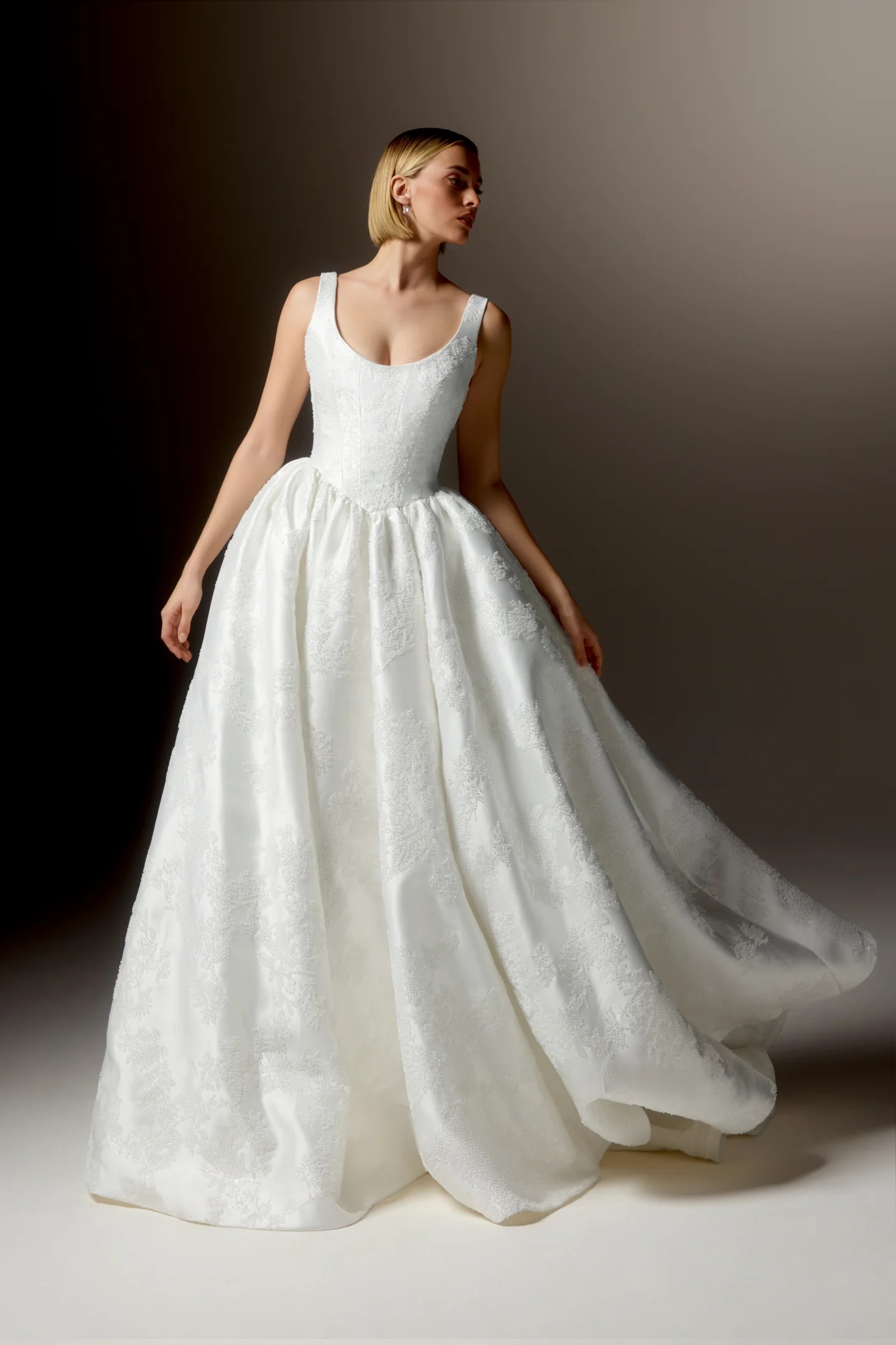 Serata — beaded scoop-neck ballgown with a fitted bodice and full skirt