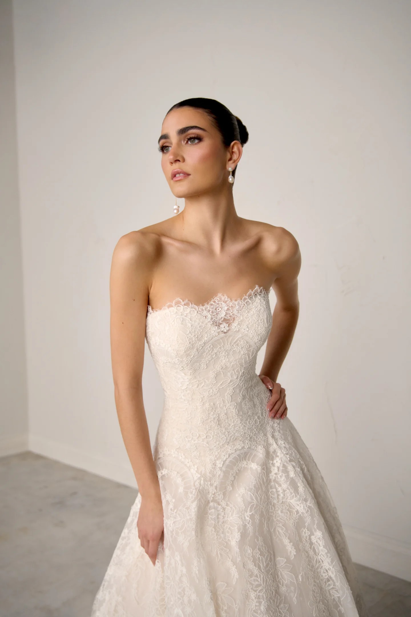 Tessera — strapless scalloped lace A-line wedding dress with cathedral train