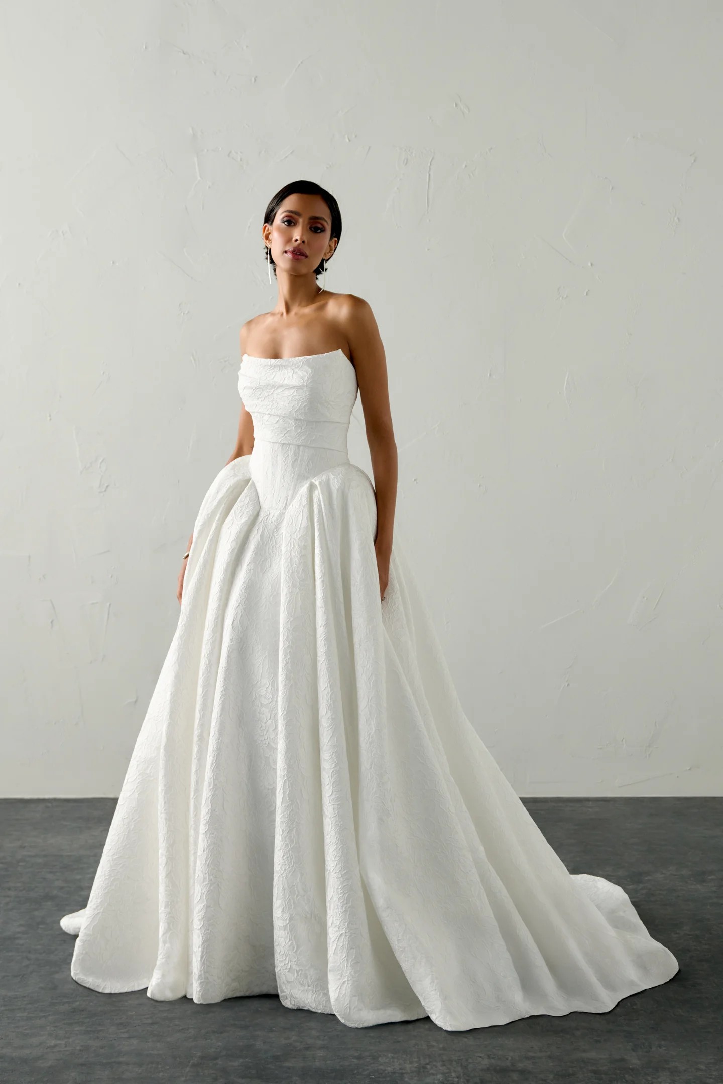 Romelle — strapless textured jacquard ballgown with pockets